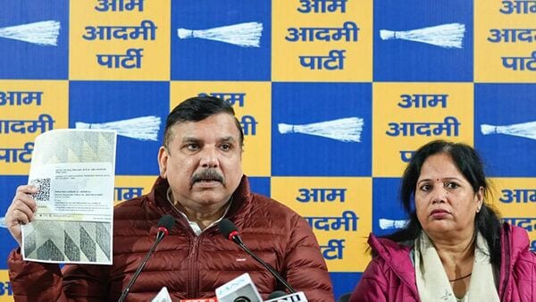 AAP MP Sanjay Singh with wife Anita Singh at a press conference, in New Delhi, Sunday. (PTI)